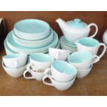Poole Pottery tea wares, teapot, ten cups, eight saucers, twenty plates of various size, cream and