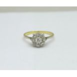 An 18ct gold and platinum set diamond cluster ring, 2.6g, S