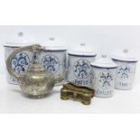 A set of five graduated enamel storage jars, a pair of theatre glasses and an oriental metal teapot