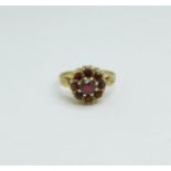 A 9ct gold and garnet cluster ring, 2.4g, K