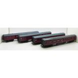 Four Hornby OO gauge model railway carriages