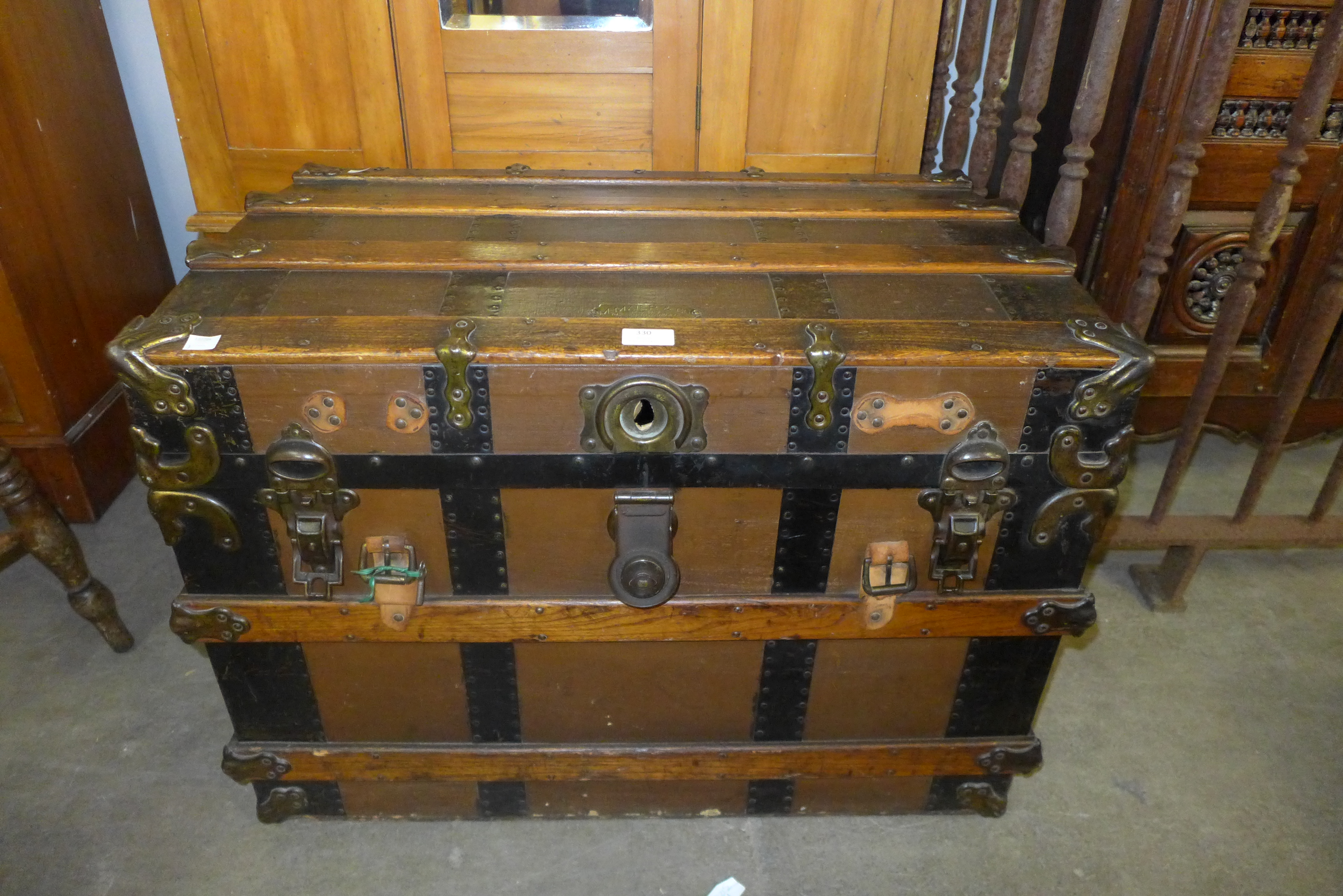 M. Maier & Co Detroit, Michigan banded travel trunk