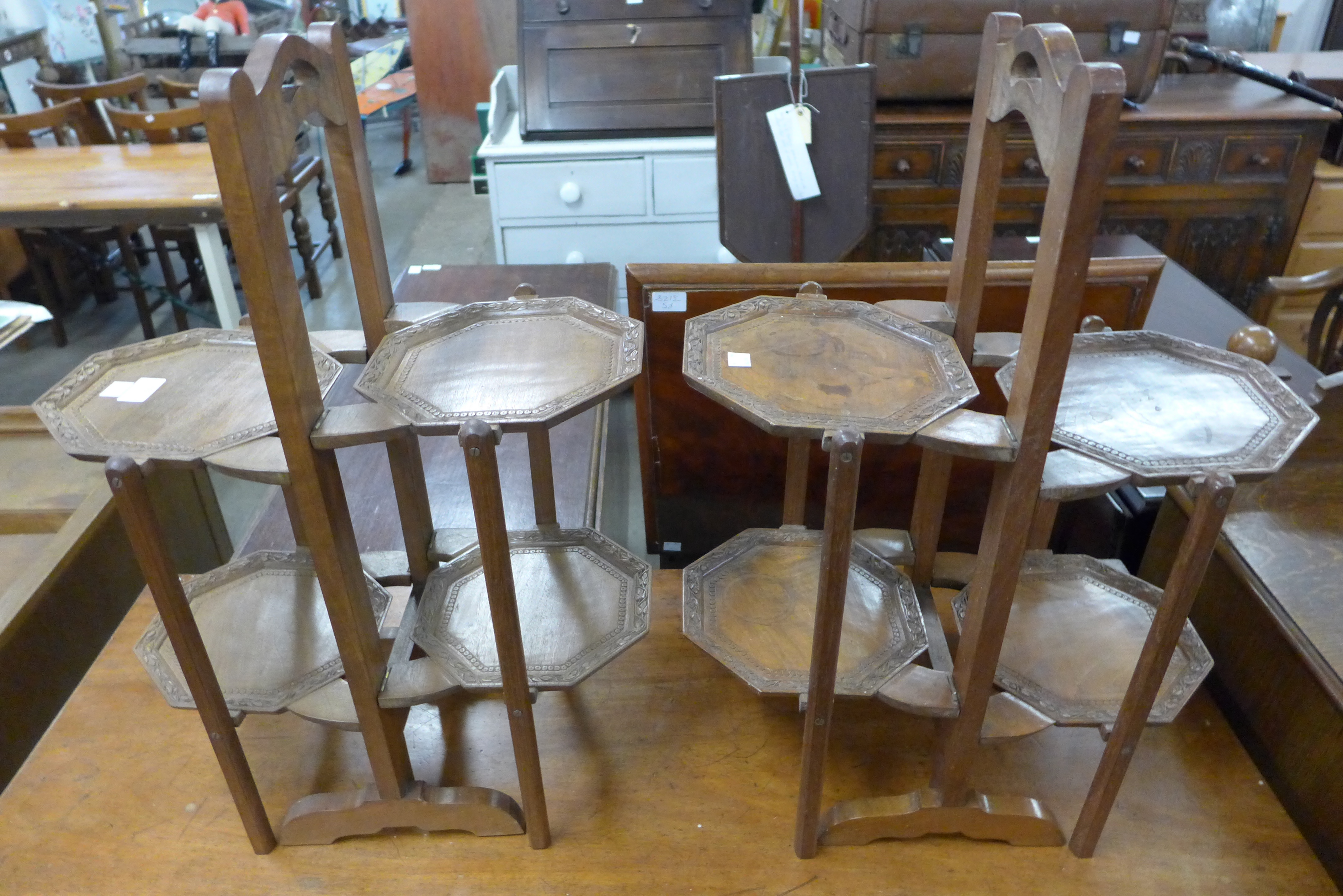 A pair of Eastern hardwood folding cake stands