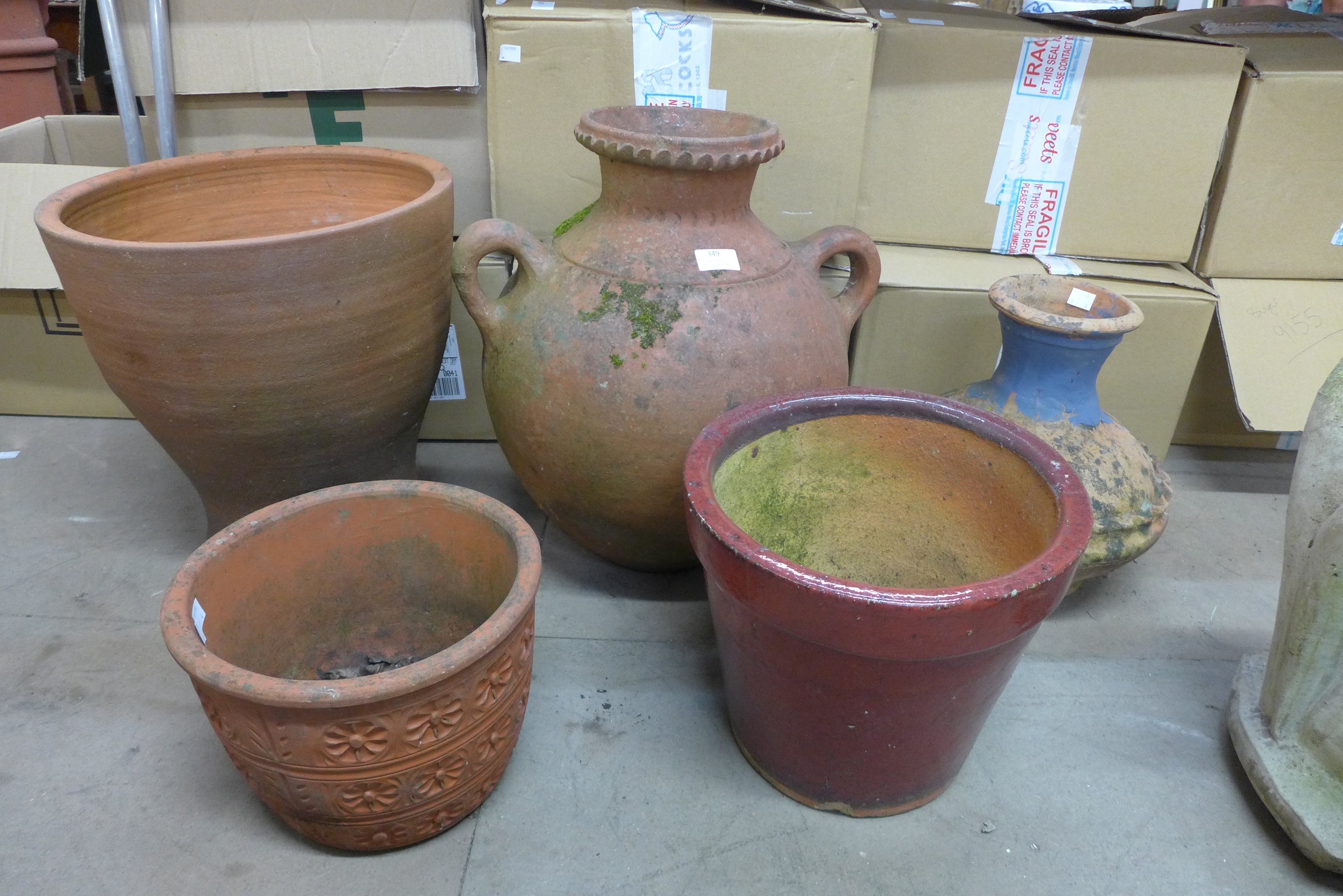 Five terracotta garden pots