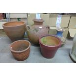 Five terracotta garden pots