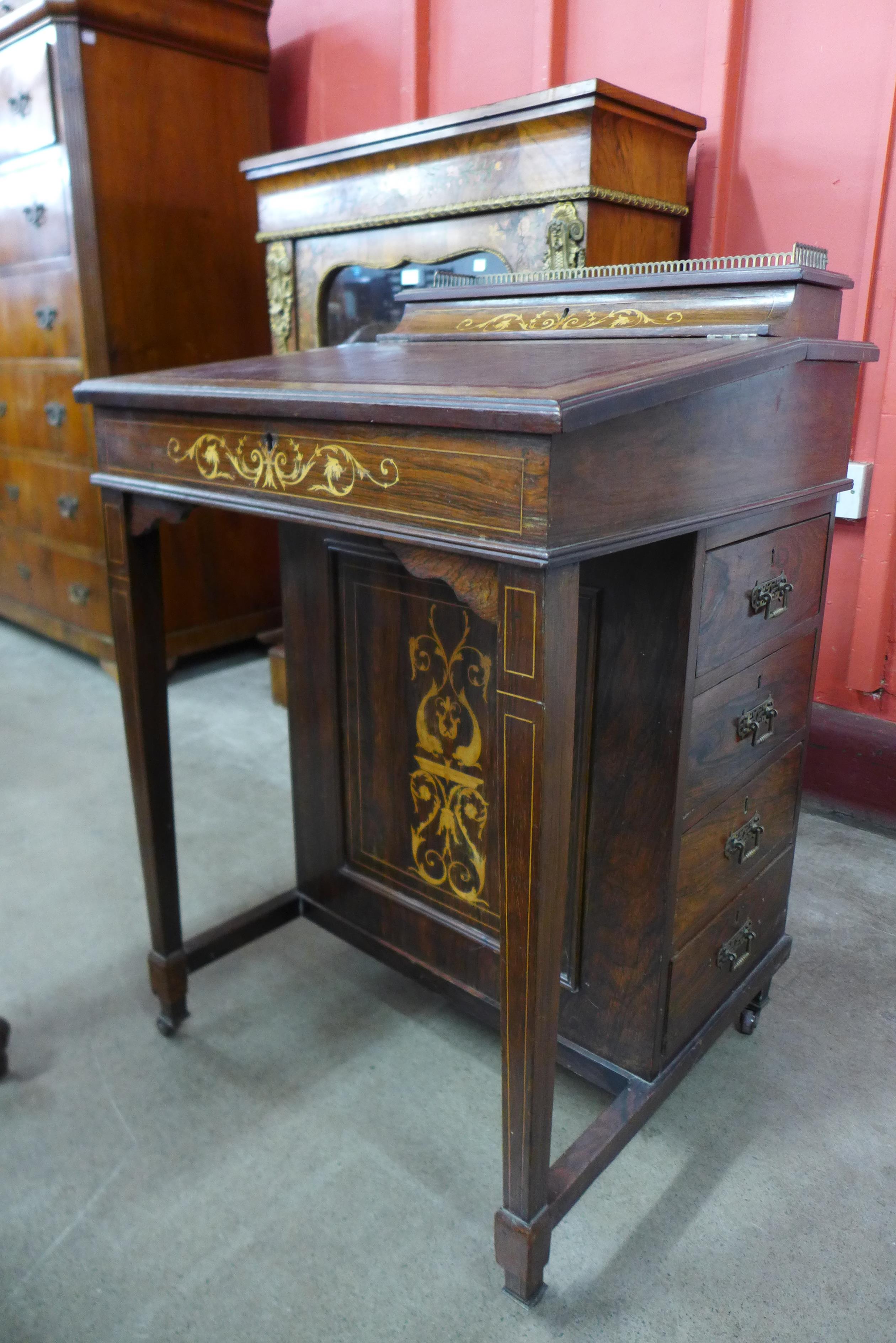 A late Victorian inlaid rosewood Davenport