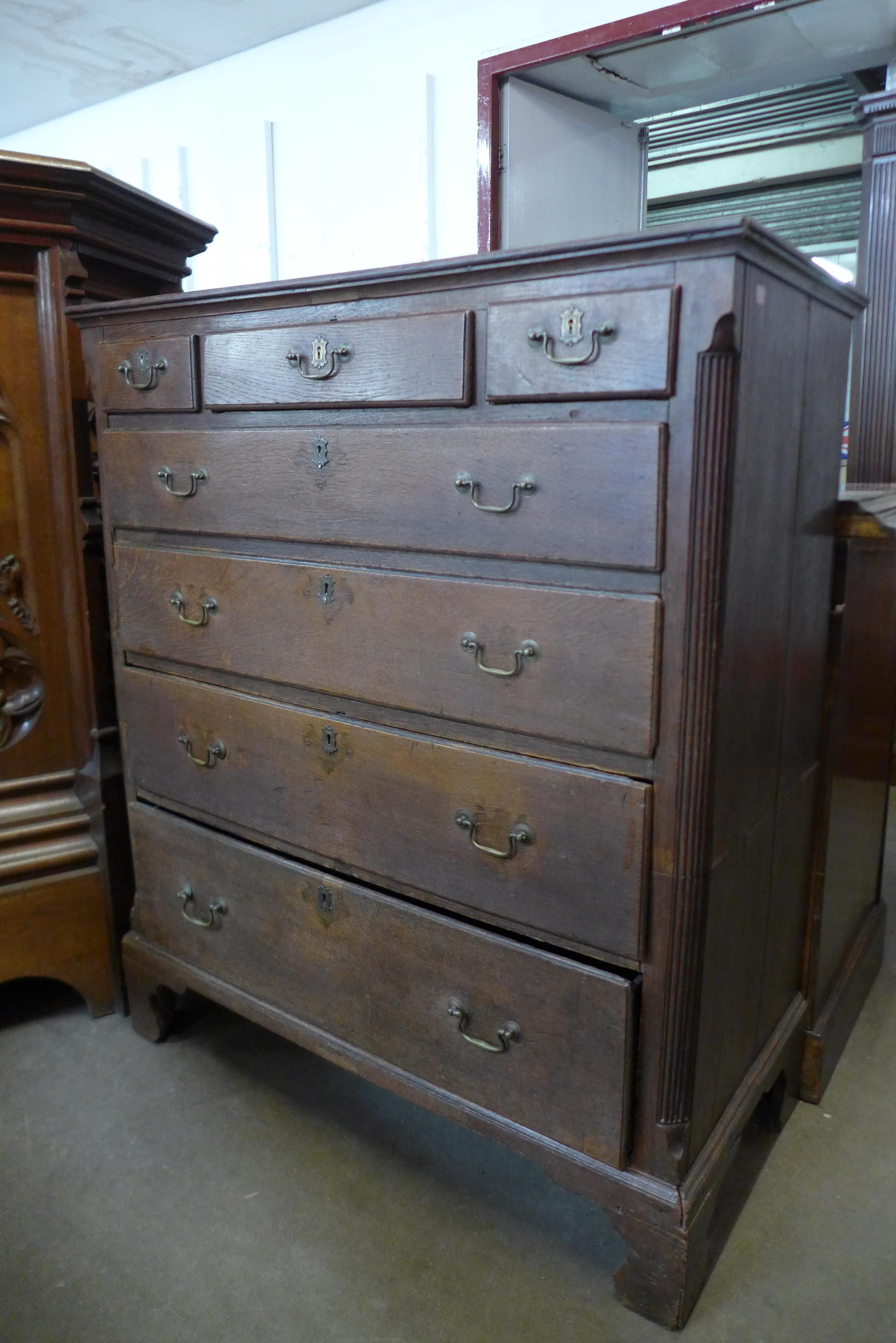 A George II oak chest of drawers