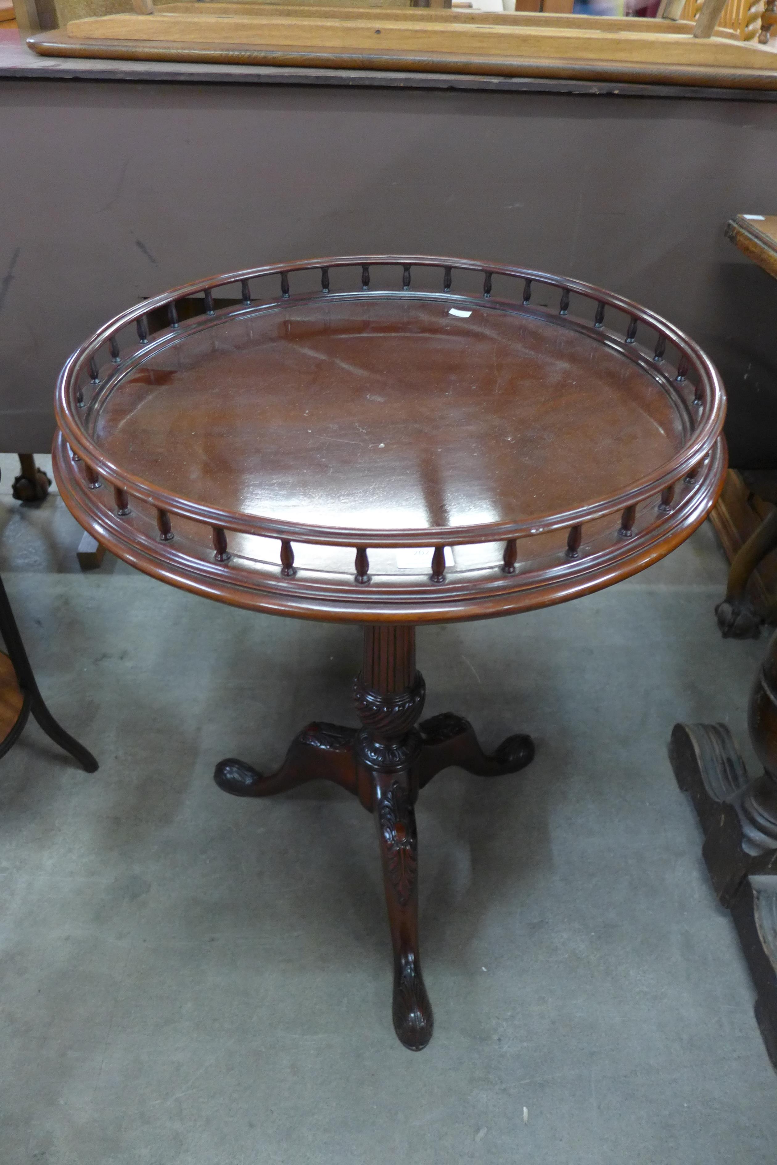 A Chippendale Revival mahogany gallery top tripod table