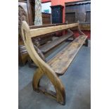 A Victorian Gothic pine church pew