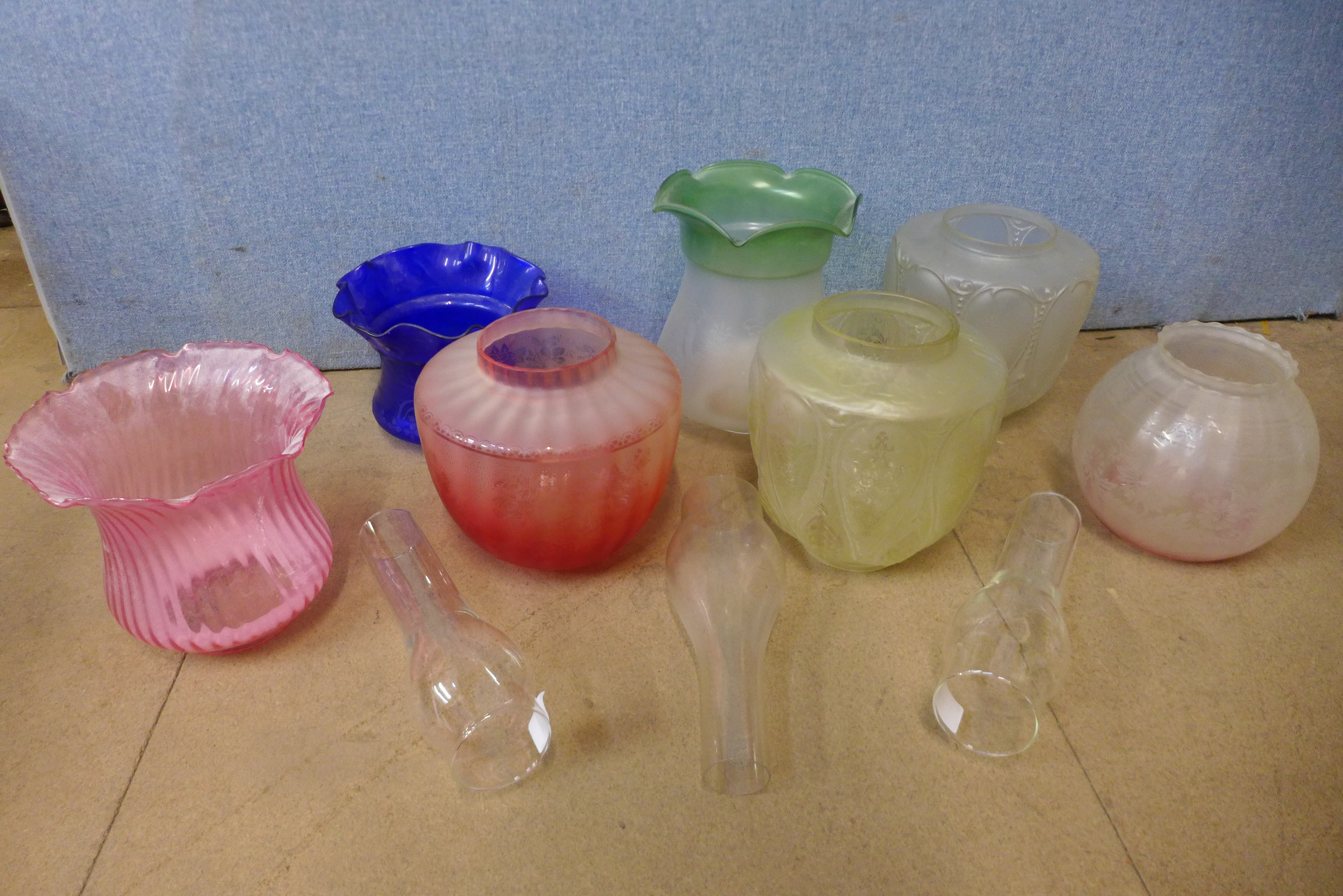 Seven assorted glass oil lamp shades