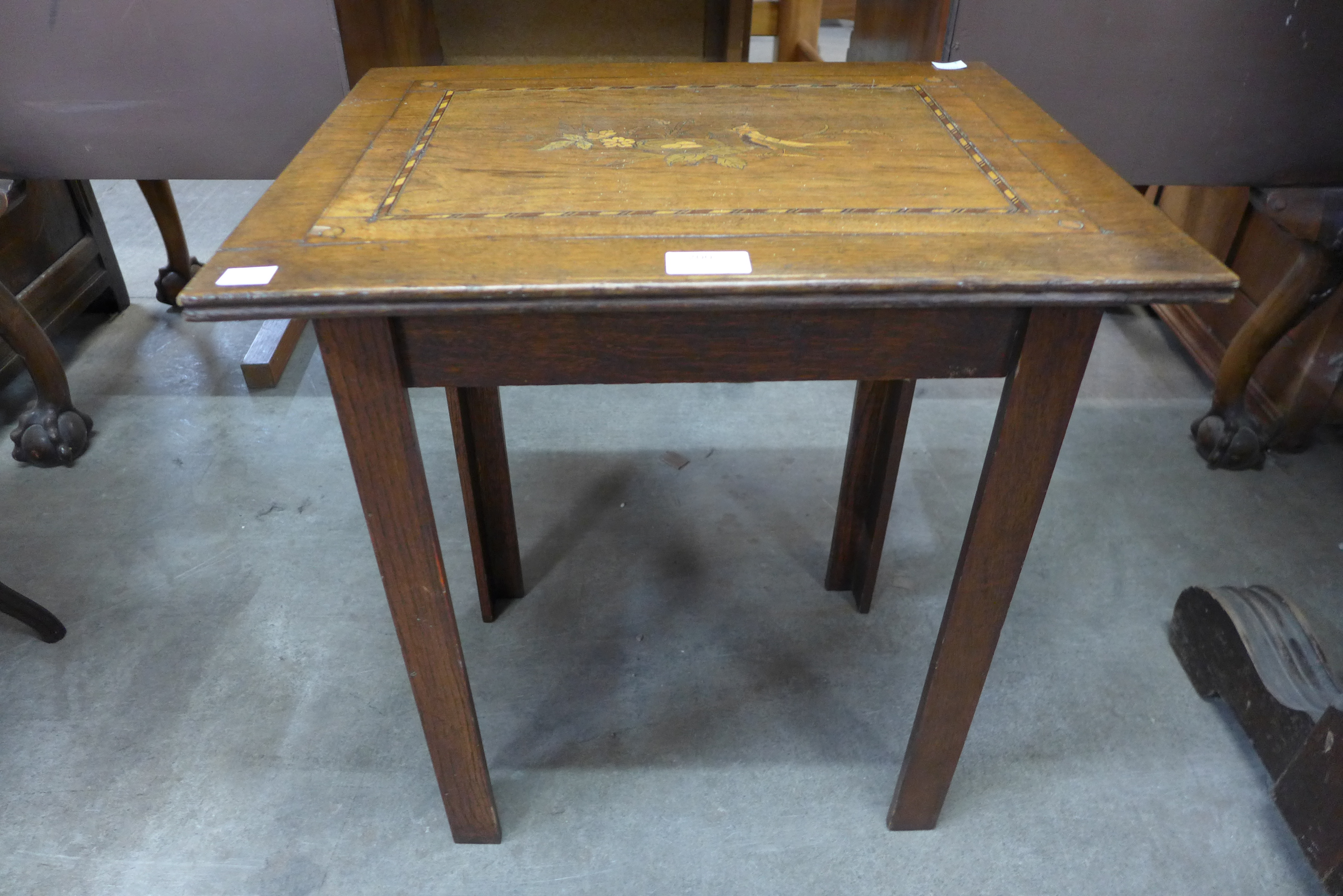 A 19th Century Italian oak and marquetry inlaid occasional table