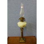 A Victorian brass Corinthian column oil lamp, with painted opaque glass reservoir