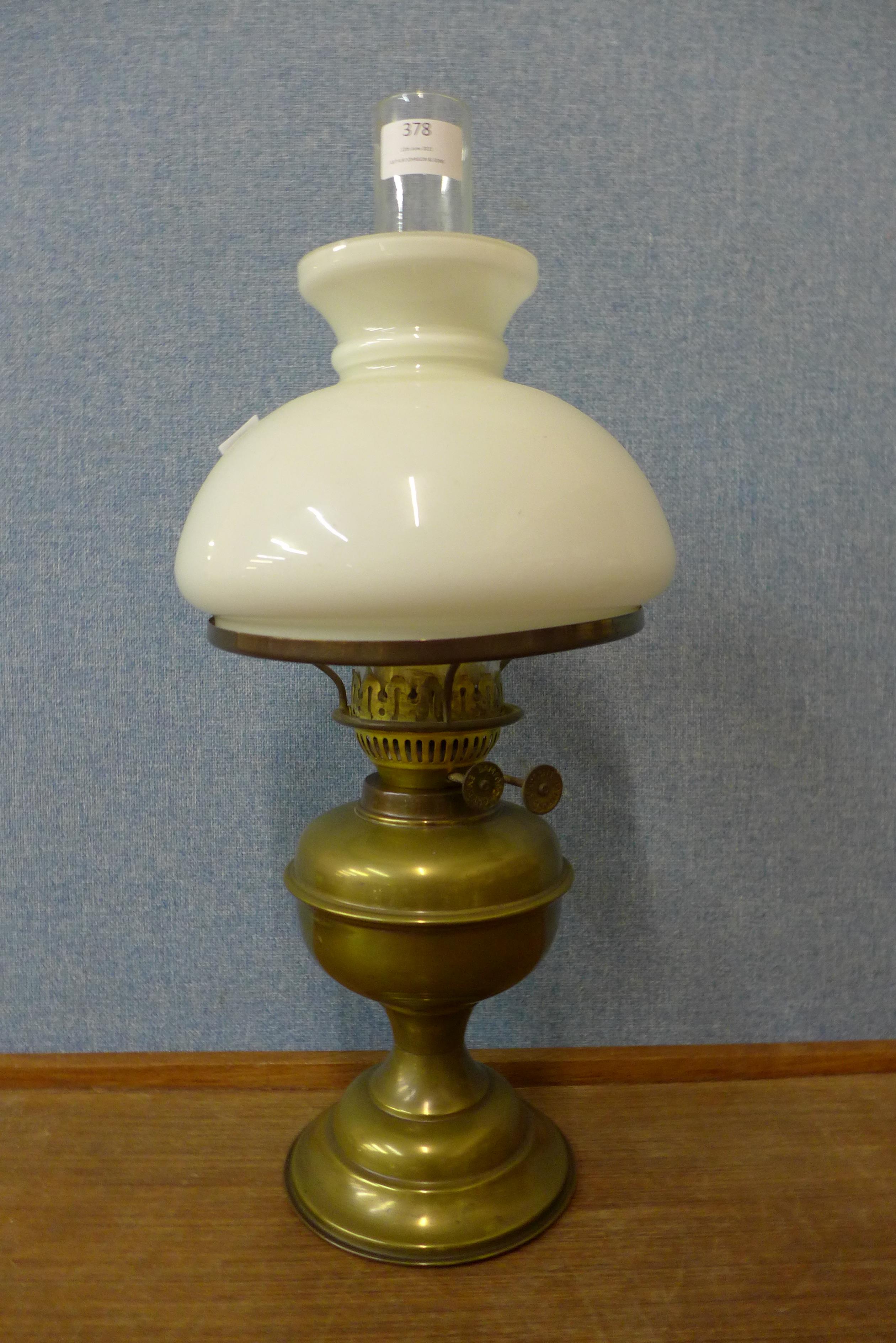 A Victorian brass oil lamp