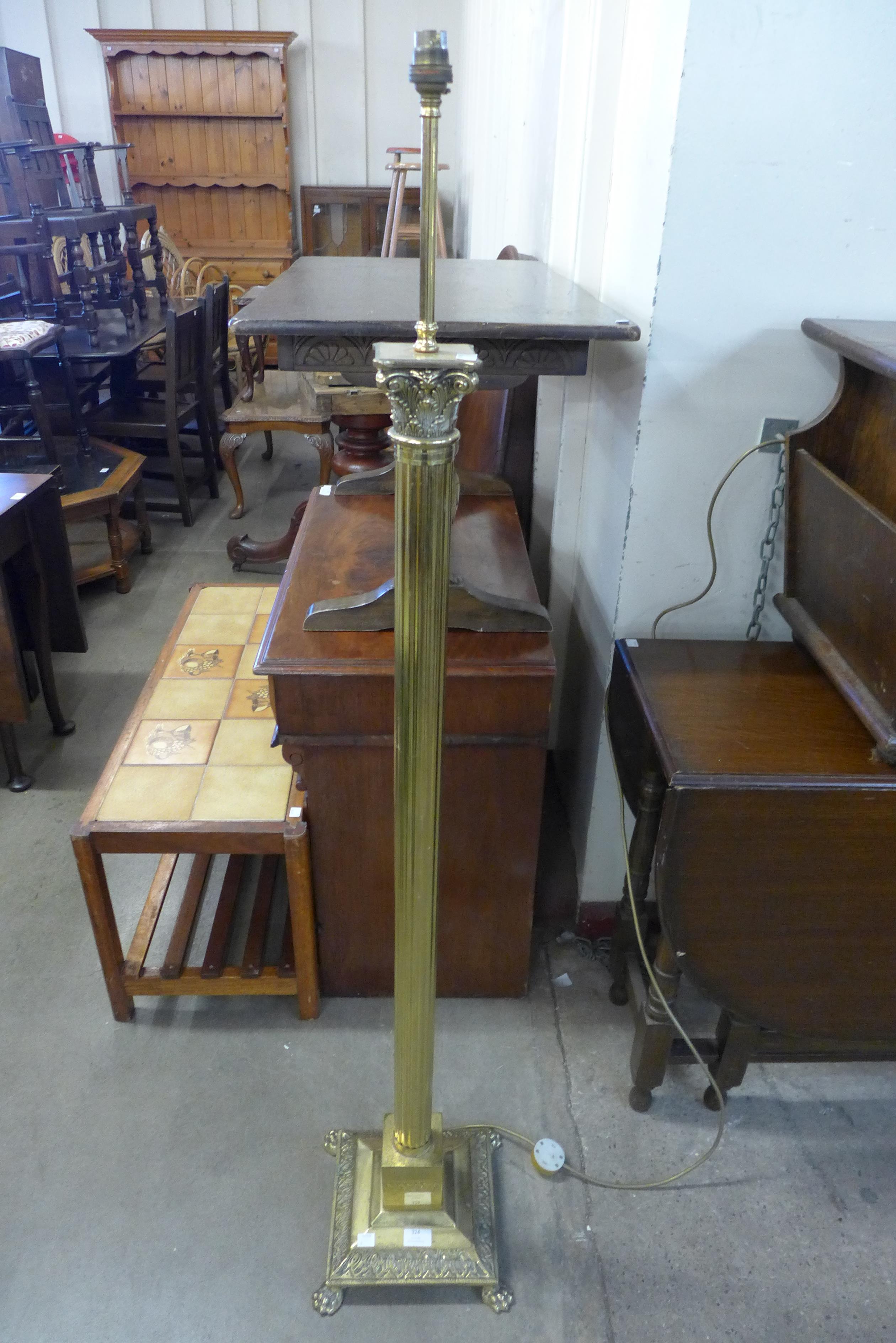 A brass Corinthian column standard lamp