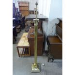 A brass Corinthian column standard lamp