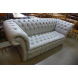 A duck egg blue leather Chesterfield settee