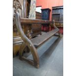 A Victorian Gothic pine church pew