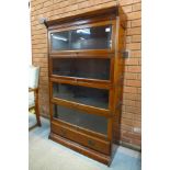 An early 20th Century mahogany four tier sectional stacking bookcase