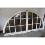 An arched stained glass window