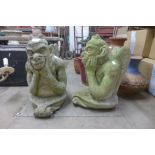 A pair of concrete garden figures of gargoyles