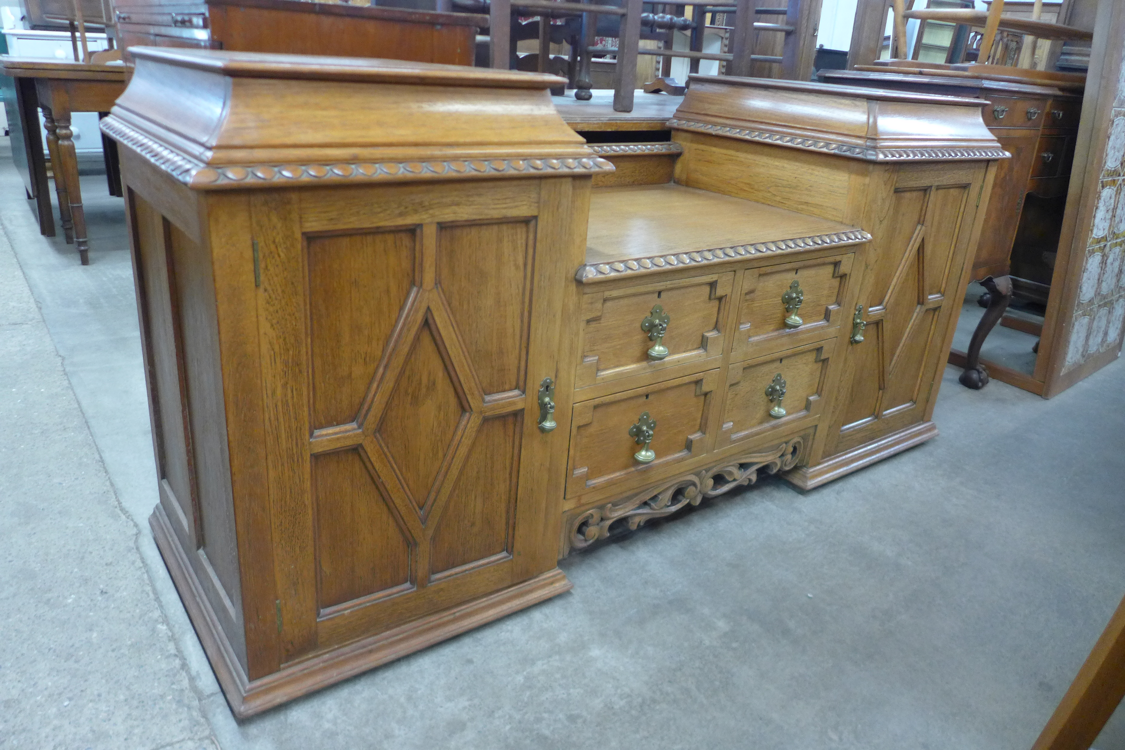 A carved oak barleytwist ten piece dining suite, comprising extending table, eight chairs and buffet - Image 3 of 3