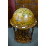 A terrestrial globe cocktail cabinet