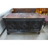 A William III carved oak panelled coffer