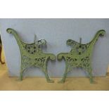 A pair of cast iron bench ends