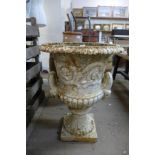 A Victorian cast iron campagna shaped garden urn