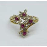 A 9ct gold, diamond and ruby ring, 2.9g, T