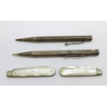 Two silver and mother of pearl fruit knives and two Yard-O-Led pencils, one sterling silver and