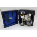 A silver travel communion set, hallmarked London 1921, the tray bears inscription dated 1923, cased,