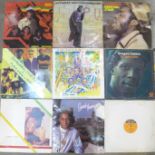 Twenty-five reggae records, fourteen LPs and ten 12" singles, one 7" single, Dance Hall, Roots,