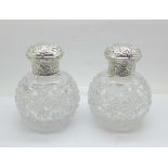 A pair of late Victorian silver and cut glass scent bottles, London 1889, with inner stoppers