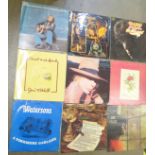 Twenty-one vinyl LP records, mostly 1960's and 1970's folk, pop and jazz, including Al Stewart (