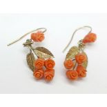 A pair of 9ct gold and carved coral earrings, 28mm