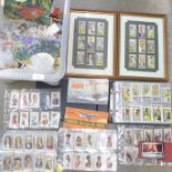 A collection of cigarette cards and tea cards