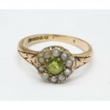 A 9ct gold, peridot and pearl cluster ring, Chester 1910, 2.8g, O