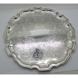 An engraved silver salver, Sheffield 1920, 955g, 31cm