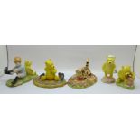 A collection of five Royal Doulton Winnie the Pooh figures, boxed