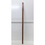 A walking cane with spirit holder and cup
