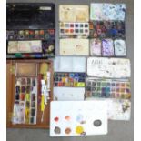 Five early/mid 20th Century tins of watercolour paints and a wooden box of watercolours