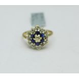 A 9ct gold, diamond and sapphire cluster ring, 2.3g, K