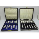 Two sets of six silver spoons including one commemorative, cased, 133g