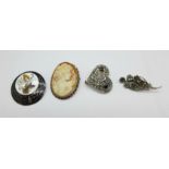 Four brooches; one 925 silver and heart shaped, one 925 silver cameo, one Siam sterling and one