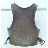 An 18th Century armour breast plate with later added bottom plate