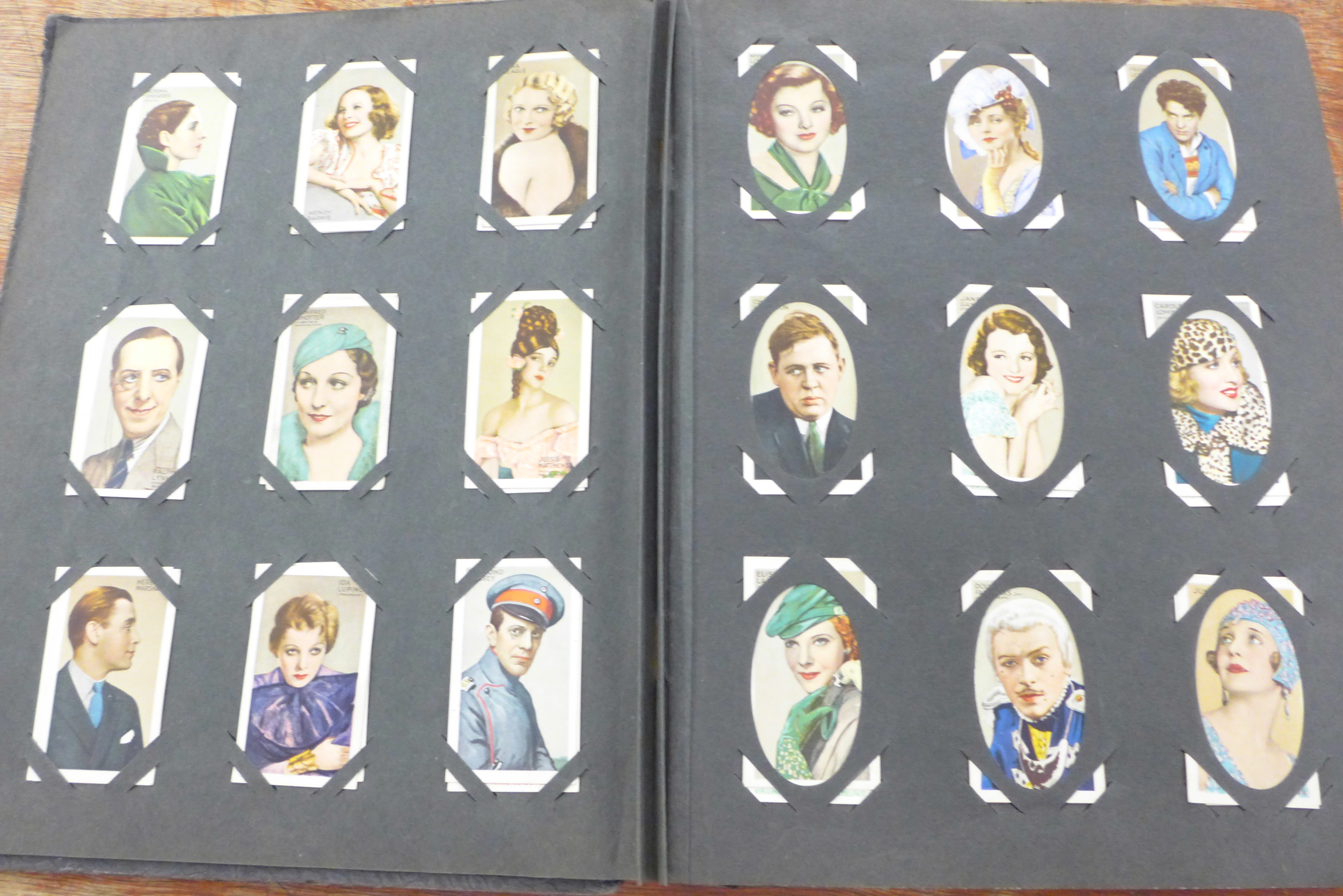 An album of cigarette cards; actors and actresses, locomotives, butterflies and moths, dogs, - Image 3 of 9