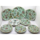 Seven 19th Century Chinese celadon famille rose plates with under glaze cobalt blue mark and another