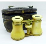 A pair of ivory opera glasses, cased, a/f