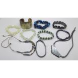 Gem set bracelets and necklaces including pearl, horn, etc.